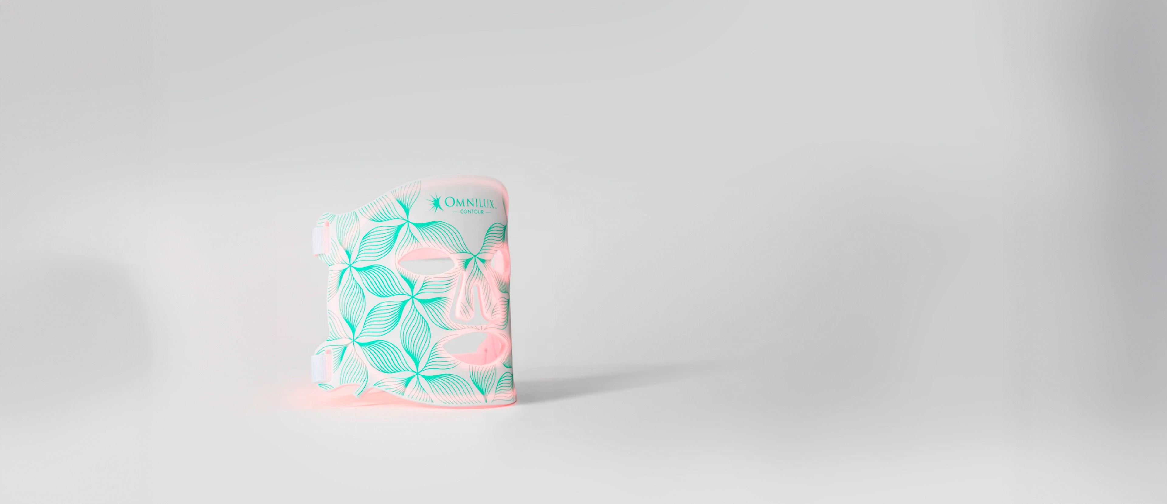 Omnilux Contour Face mask on a light grey surface Omnilux Contour Face mask on a light grey surface